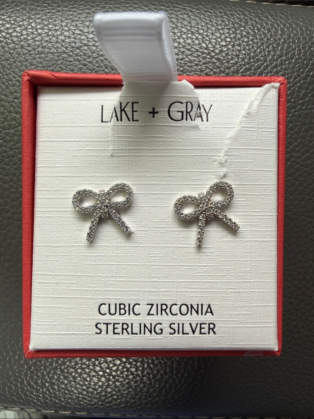 Sterling Silver Cubic Zirconia Bow Earrings - Silver